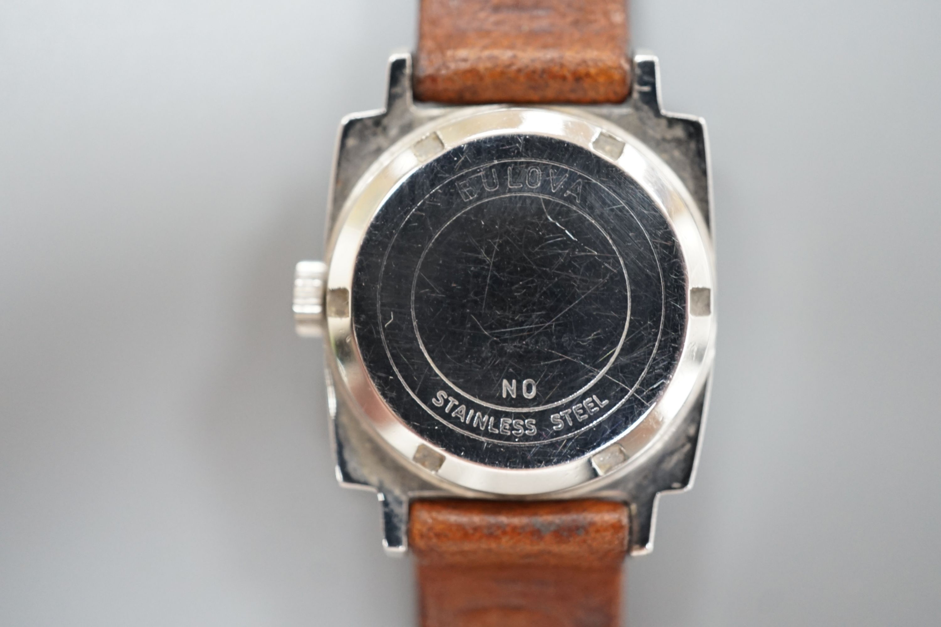 A lady's stainless steel Bulova manual wind wrist watch, on a Hirsch leather strap.